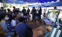 <p>Family members of the 12 boys and their soccer coach watch a video clip of 12 boys on television after they were found alive, in Chiang Rai Province, in northern Thailand, Wednesday, July 4, 2018. (Photo: Sakchai Lalit/AP) </p>