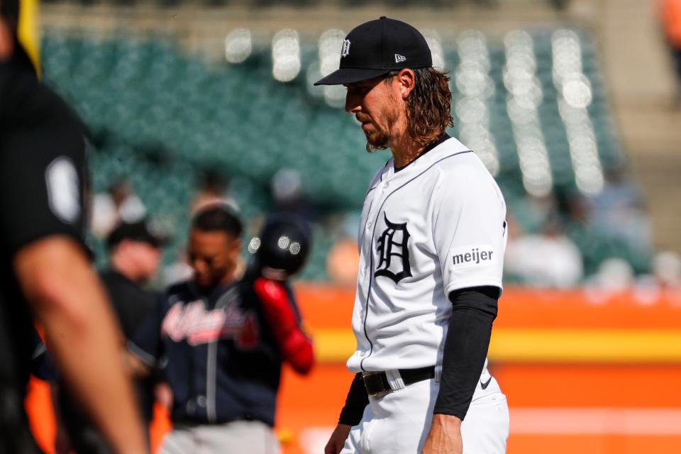 Detroit Tigers pitcher Michael Lorenzen (21) walks off the field after the second inning against the Atlanta Braves in Game 2 of the doubleheader at Comerica Park in Detroit on Wednesday, June 14, 2023.