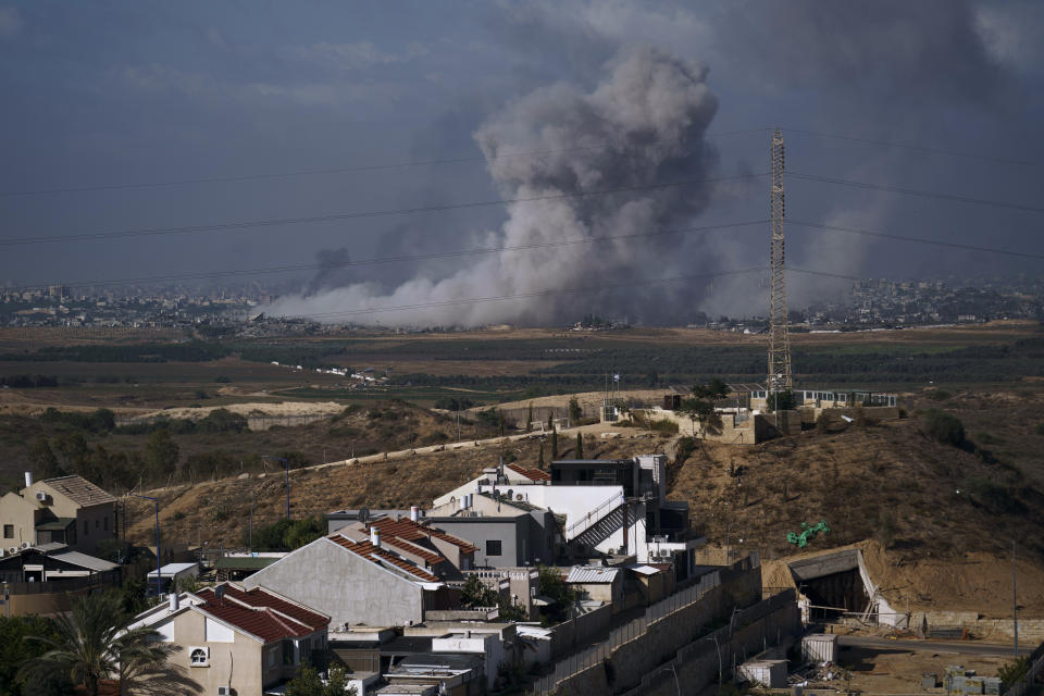 Smoke rises following an Israeli airstrike in the Gaza Strip, as seen from the town of Sderot, southern Israel, Tuesday, Nov. 21, 2023. (AP Photo/Leo Correa)