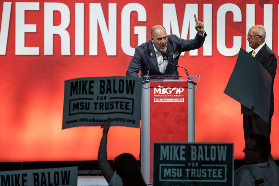 MSU Trustee candidate Mike Balow speaks on stage during the MIGOP State Convention at the DeVos Place in Grand Rapids on April 23, 2022.