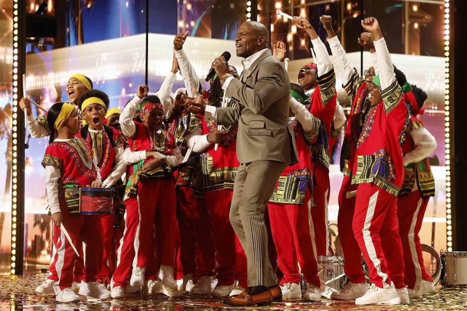 <p>Trae Patton/NBC</p> Terry Crews with Chioma and The Atlanta Drum Academy