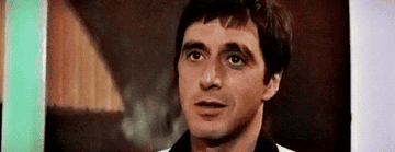 Al Pacino in "Scarface" smiles