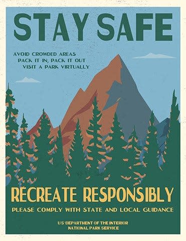 A National Park Service poster advertises social distancing.