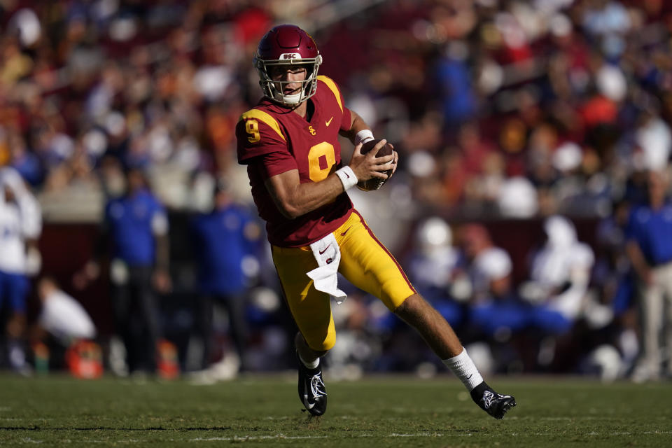 Southern California quarterback Kedon Slovis (9) runs the ball during the second half of an NCAA college football game against San Jose State Saturday, Sept. 4, 2021, in Los Angeles. (AP Photo/Ashley Landis)