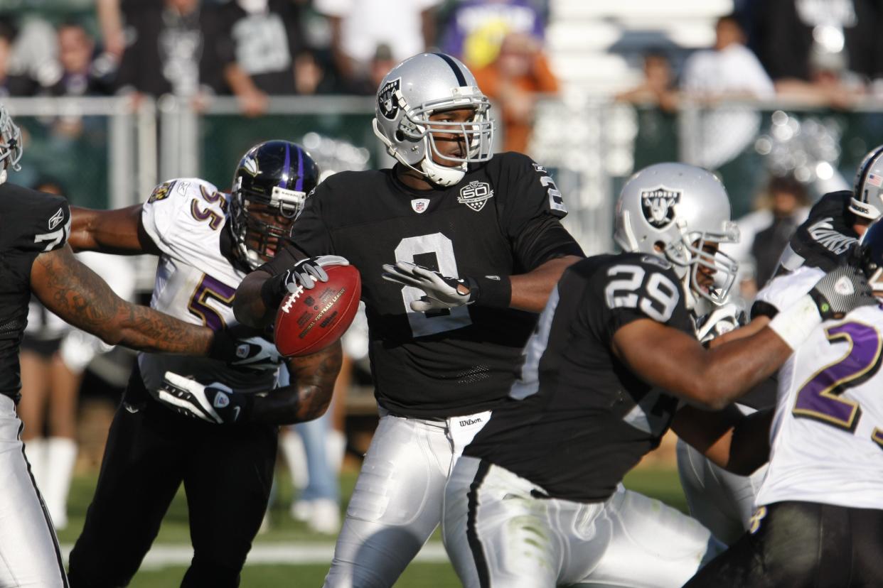 Mandatory Credit: Photo by Paul Sakuma/AP/Shutterstock (6029563aw)JaMarcus Russell Oakland Raiders quarterback JaMarcus Russell (2) in action during the third quarter of an NFL football game in Oakland, CalifRavens Raiders Football, Oakland, USA.