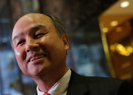 Softbank CEO Masayoshi Son speaks to the press after meeting with U.S. President-elect Donald Trump at Trump Tower in Manhattan, New York City, U.S., December 6, 2016. REUTERS/Brendan McDermid