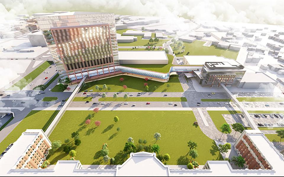 A rendering of a new expanded Detroit medical campus part of the Henry Ford Health system. The Henry Ford Health system plans to build a new hospital tower across from existing Henry Ford Hospital in Detroit. At the same time, Detroit Pistons owner Tom Gores announced plans for a spin-off commercial and residential development.