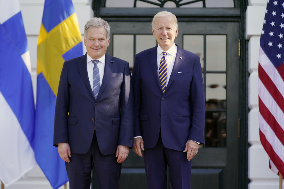 FILE - President Joe Biden greets President Sauli Niinisto of Finland as he arrive at the White House in Washington, May 19, 2022. Biden will spend four days in three nations next week as he travels through Europe tending to alliances that have been tested by Russia's invasion of Ukraine. His third and final stop will be Helsinki, to celebrate Finland's status as the newest member of NATO. (AP Photo/Andrew Harnik, File)