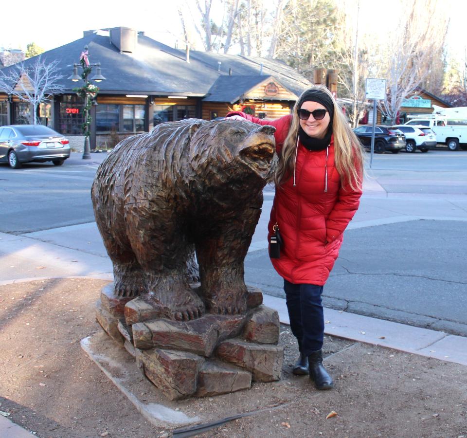 The village bear greeting Laureen on her trip to the Village at Big Bear Lake, as seen on December 9, 2023. Visitors can enjoy all the photo ops this small village has to offer during any season.
