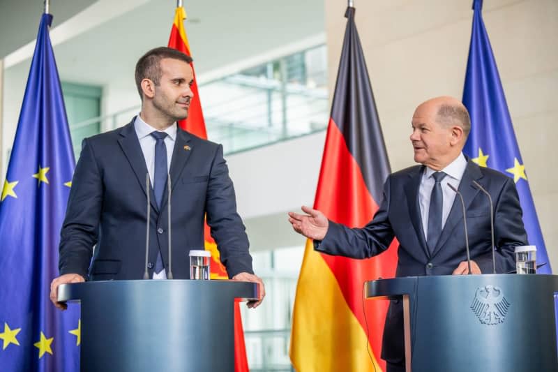 German Chancellor Olaf Scholz (R) takes part in a press statement at the Federal Chancellery alongside Milojko Spajic, Prime Minister of Montenegro. Scholz and Spajic are meeting for bilateral talks. Michael Kappeler/dpa