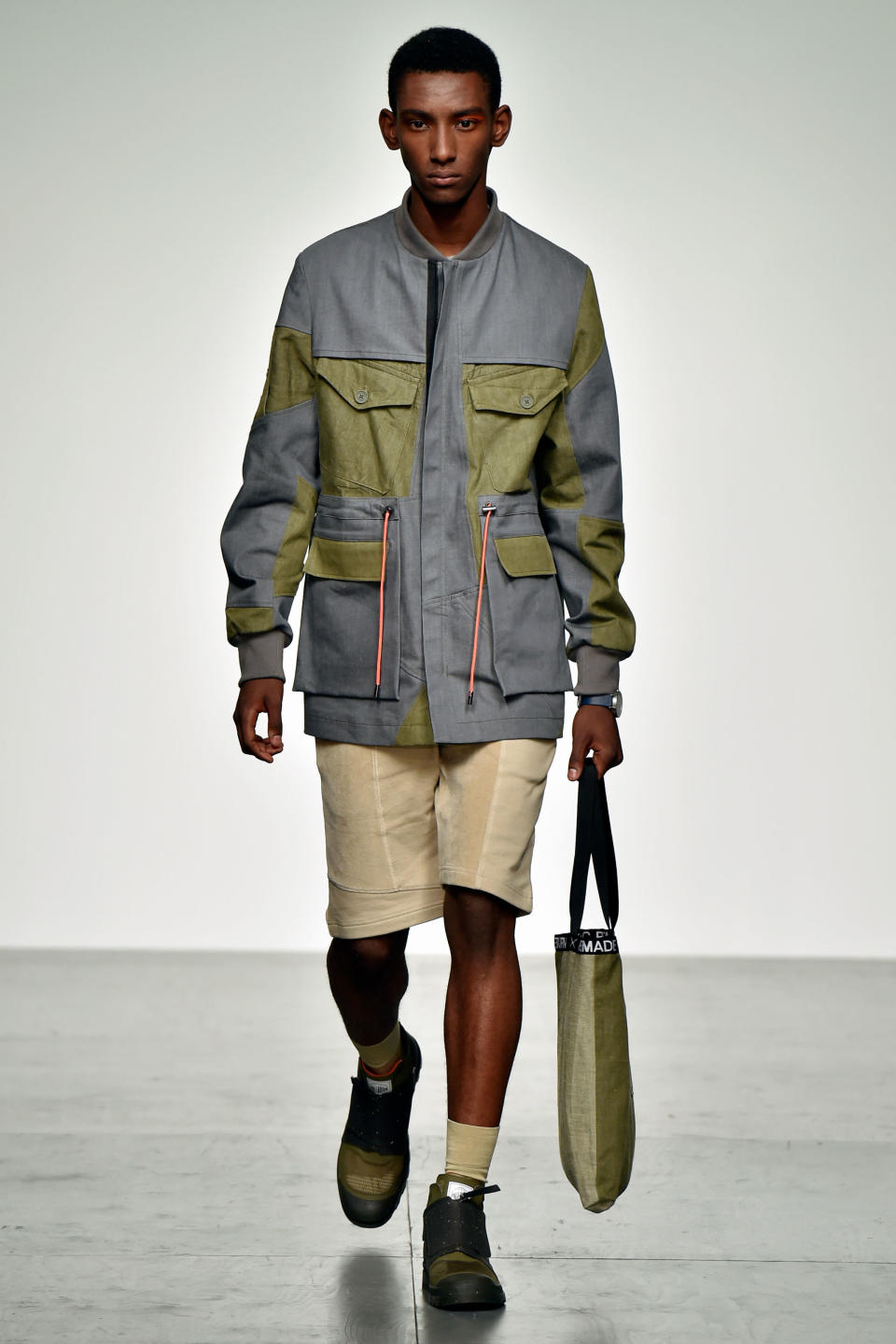 <p><strong>Christopher Raeburn</strong></p><p>Also referencing the spirit of the great outdoors was Christopher Raeburn, who remains the undisputed master of military cool. His assortment of oversized parkas, field jackets, and ultra-modern sportswear was inspired by <em>The Long Walk</em>, which details the experiences of Slavomir Rawicz; a Polish Army lieutenant who trekked 4,000 miles from Siberia to British India during World War II after escaping from a Russian internment camp. Incarceration and conflict aside, what man doesn't need a bit of camo in his life?</p>