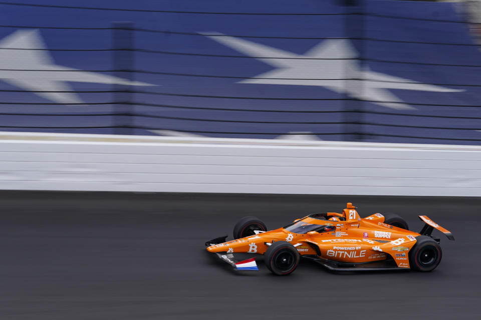 Rinus VeeKay, of The Netherlands, heads into the first turn during qualifications for the Indianapolis 500 auto race at Indianapolis Motor Speedway in Indianapolis, Sunday, May 22, 2022. (AP Photo/Michael Conroy)