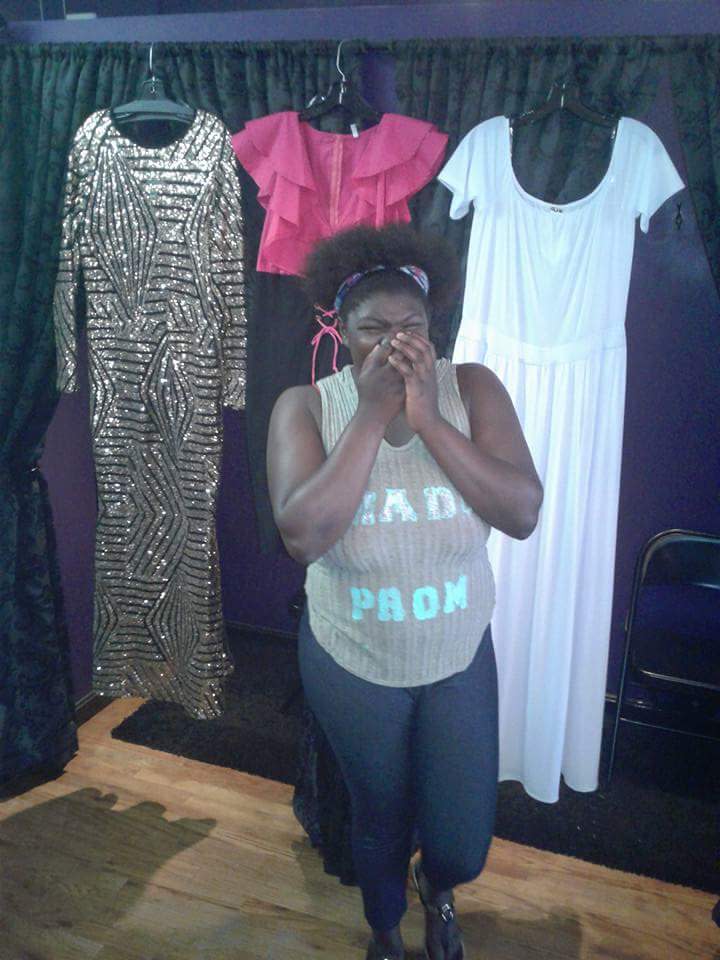 Emotion overwhelms Gooden Brown as she picks out a dress. (Photo: Quinniya Hearn)