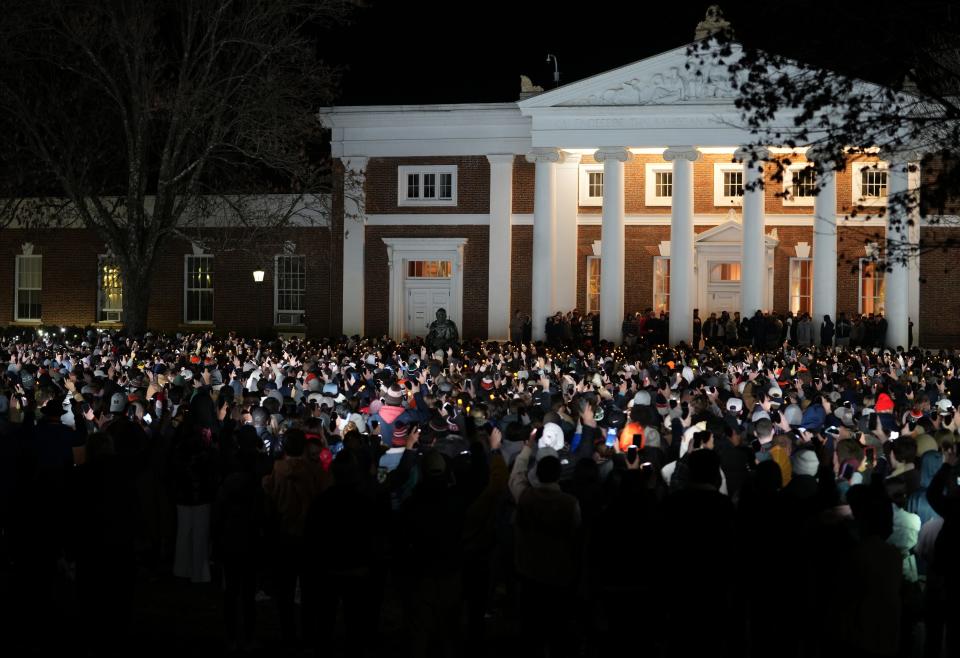 Hundreds gathered for a vigil Monday after a shooting Sunday evening at the University of Virginia left three dead and two injured. 