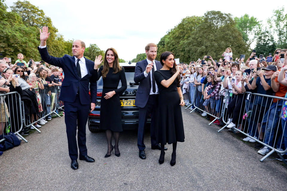 <p>From left: Prince William, Prince of Wales; Catherine, Princess of Wales; Prince Harry, Duke of Sussex; and Meghan, Duchess of Sussex wave to the crowds on their walk at Windsor Castle on Sept. 10, 2022 in England. (Photo by Chris Jackson - WPA Pool/Getty Images)</p> 