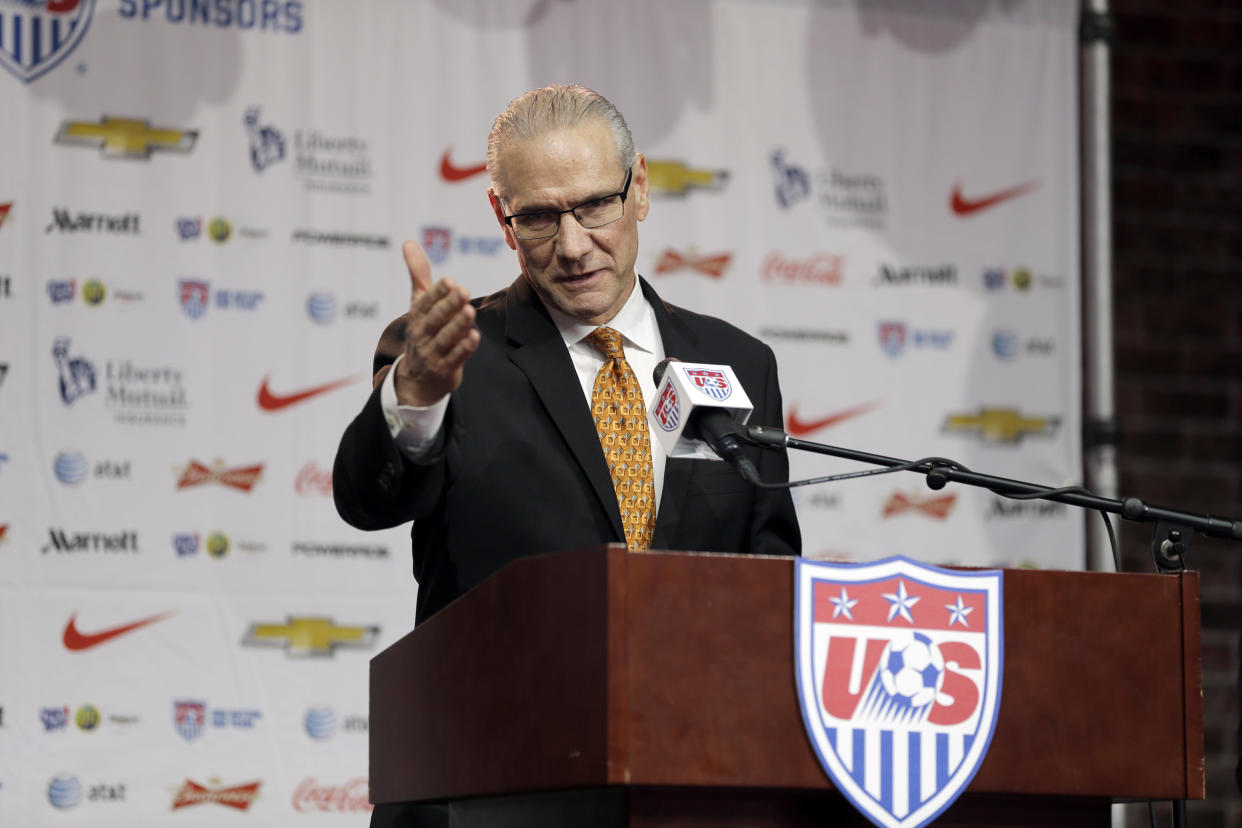 United States Soccer Federation Secretary General Dan Flynn speaks during a news conference Monday, July 27, 2015, in St. Louis. The news conference was held to announce the U.S. soccer team will play its first qualifier for the 2018 World Cup at Busch Stadium in St. Louis on Nov. 13, 2015. (AP Photo/Jeff Roberson)