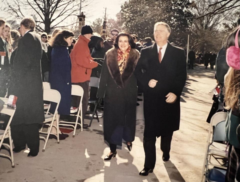 After being sworn in as North Carolina's governor, Mike Easley and wife, Mary Easley walk through the crowd.