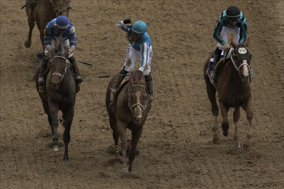 Javier Castellano celebrates after riding Mage to win the 149th running of the Kentucky Derby horse race at Churchill Downs Saturday, May 6, 2023, in Louisville, Ky. (AP Photo/Charlie Riedel)