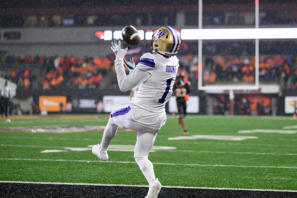 Washington Huskies wide receiver Rome Odunze catches a touchdown pass during a game against the Oregon State Beavers.