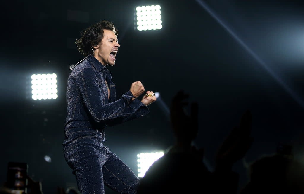 Stock image: Harry Styles performs on stage (PA)