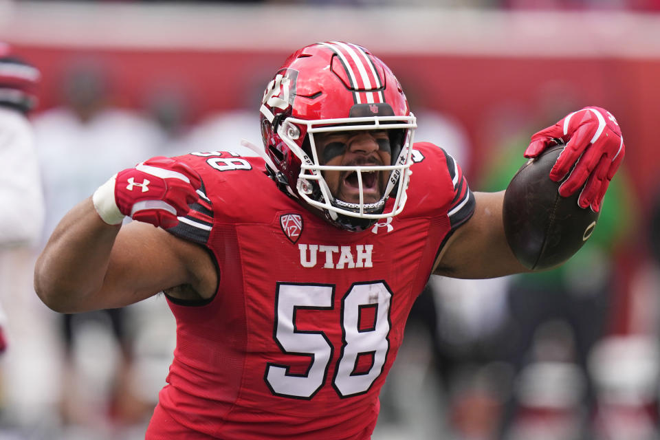 Utah defensive tackle Junior Tafuna (58) reacts after a forced fumble recovery during the first half of an NCAA college football game against Oregon Saturday, Oct. 28, 2023, in Salt Lake City. (AP Photo/Rick Bowmer)