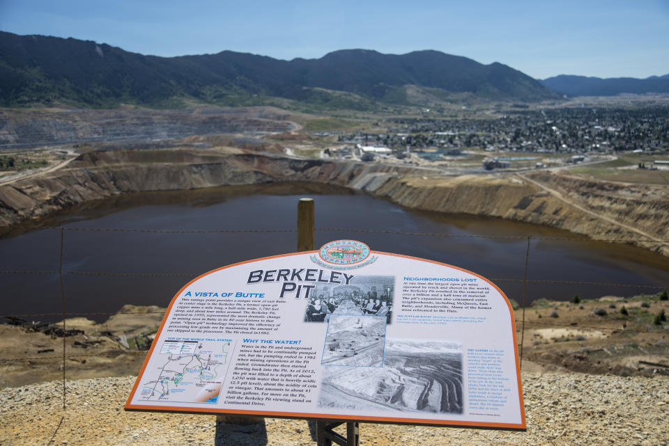 The Berkeley Pit is one of the largest Superfund sites. It is a mile-long toxic lake of heavy metals and contaminated&nbsp;water from old copper mine shafts in Butte, Montana. (Photo: William Campbell via Getty Images)