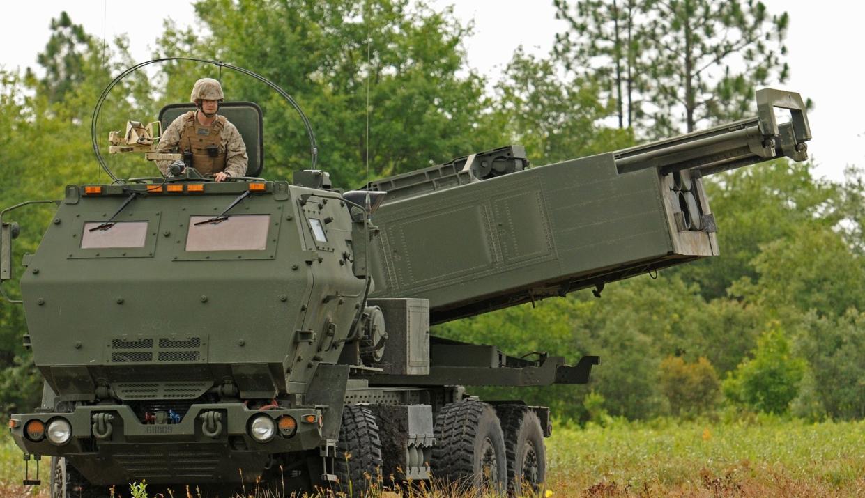 FILE - Marine Corps Sgt. Justin Russell, a High Mobility Artillery Rocket System, or HIMARS, section chief with Kilo Battery, 2nd Battalion, 14th Marines looks out over a firing range at Fort Stewart, Ga. during a training exercise, Saturday, June 13, 2015. The HIMARS systems supplied by the U.S. and similar M270 provided by Britain have significantly bolstered the Ukrainian army's precision strike capability. 