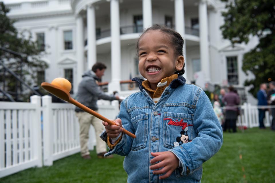 A child on the White House lawn during the Annual Easter Egg Roll.