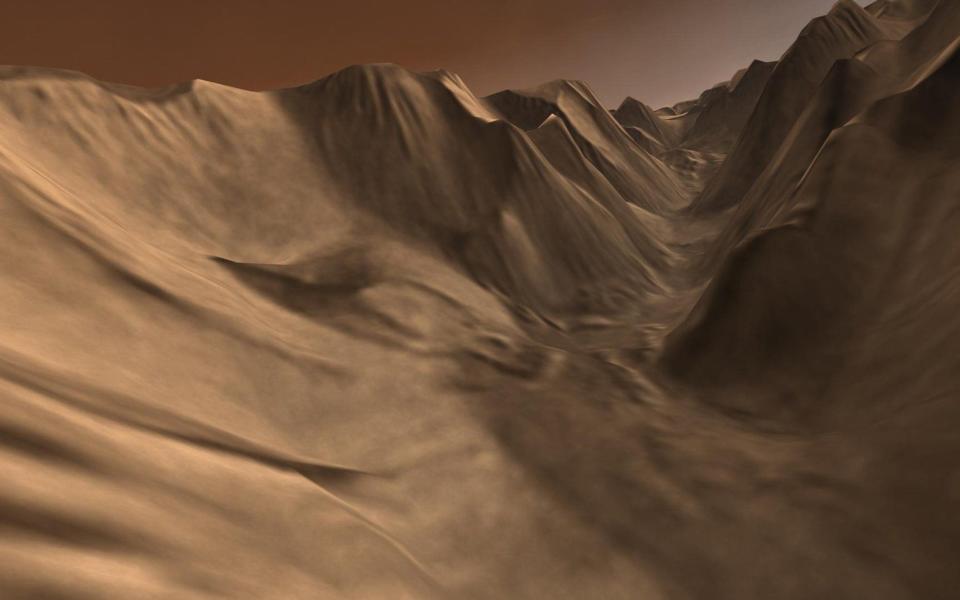 A composite view of the tributary valley on planet Mars that feeds into Valles Marineris, the "Grand Canyon of Mars", is seen in this video image released by NASA in 2006 - REUTERS/NASA