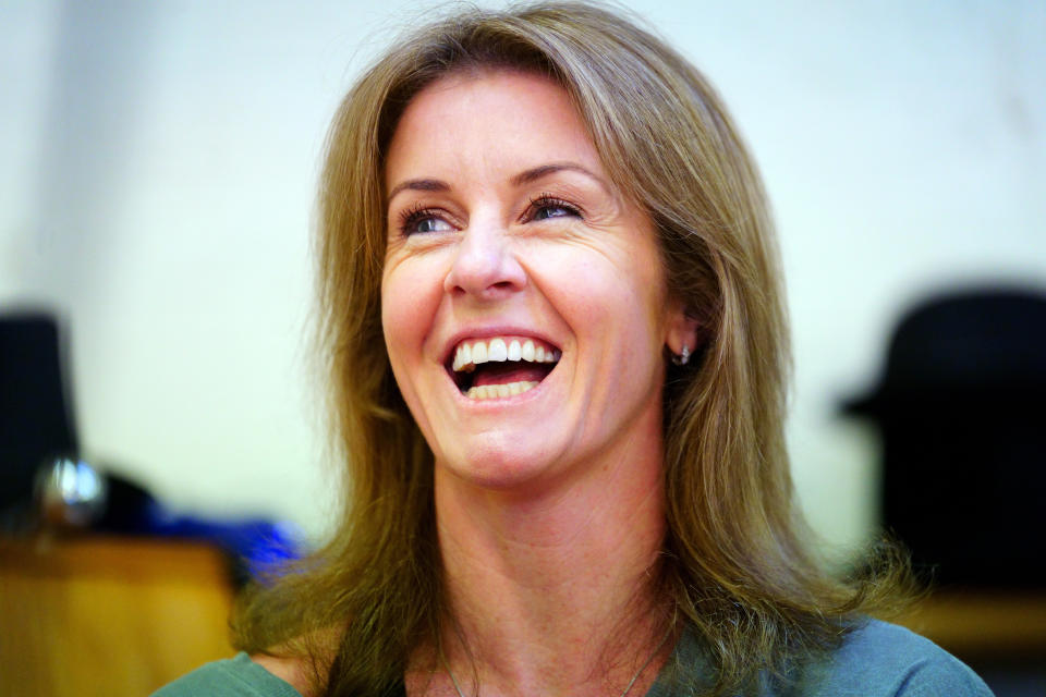 Ballroom dancer Erin Boag smiling while rehearsing with Anton Du Beke