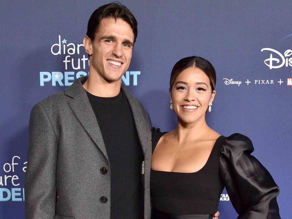 <p>Gregg DeGuire/Getty</p> Gina Rodriguez and Joe LoCicero at the premiere of "Diary Of A Future President" in 2020