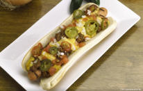 4. « Doyer Dog » (Dodger Stadium) Une saucisse au bœuf garnie de fromage à nachos, de jalapenos, de tomates tranchées et d'oignons.