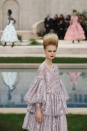 A model wears a creation for the Chanel Spring/Summer 2019 Haute Couture fashion collection presented in Paris, Tuesday Jan. 22, 2019. (AP Photo/Christophe Ena)