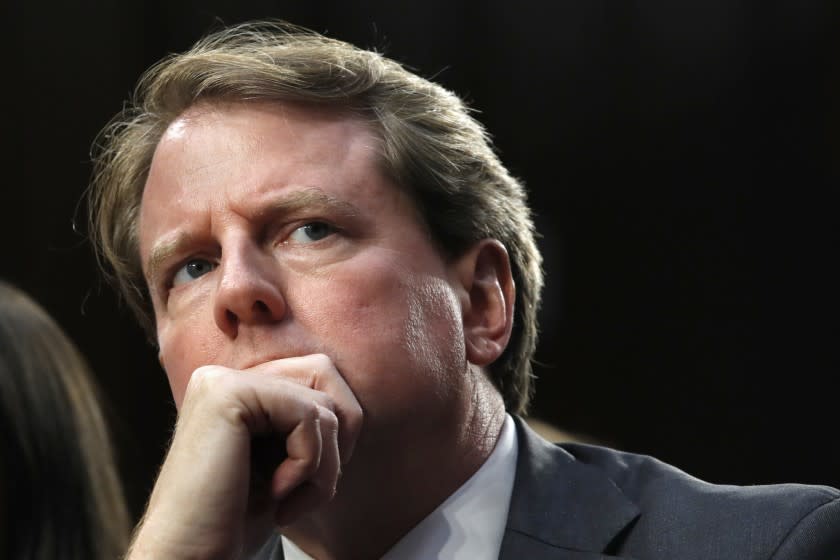 FILE - In this Sept. 4, 2018 file photo, White House counsel Don McGahn, listens as he attends a confirmation hearing for Supreme Court nominee Brett Kavanaugh before the Senate Judiciary Committee on Capitol Hill in Washington. (AP Photo/Jacquelyn Martin)