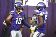 Minnesota Vikings wide receiver Adam Thielen (19) celebrates touchdown against the Seattle Seahawks with wide receiver Dede Westbrook (12) in the first half of an NFL football game in Minneapolis, Sunday, Sept. 26, 2021. (AP Photo/Bruce Kluckhohn)