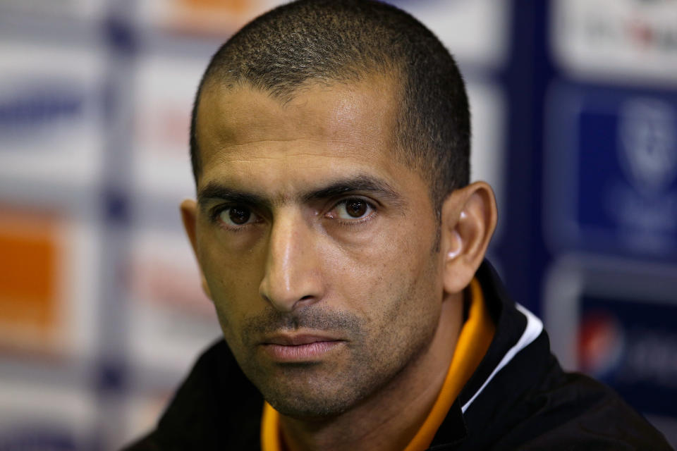 FILE - In this Feb. 1 2013, file photo, Ivory Coast's soccer head coach Sabri Lamouchi, from France, listens to questions during a news conference, Friday, Feb. 1 2013, in Rustenburg, South Africa. The Elephants had a comfortable qualification run under French coach Sabri Lamouchi, with a team filled with Europe-based talent including Manchester City's Yaya Toure. (AP Photo/Armando Franca, File)