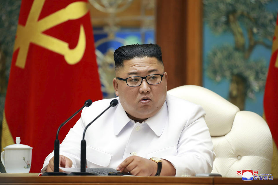 In this photo provided by the North Korean government, North Korean leader Kim Jong Un attends an emergency Politburo meeting in Pyongyang, North Korea Saturday, July 25, 2020. Independent journalists were not given access to cover the event depicted in this image distributed by the North Korean government. The content of this image is as provided and cannot be independently verified. Korean language watermark on image as provided by source reads: "KCNA" which is the abbreviation for Korean Central News Agency. (Korean Central News Agency/Korea News Service via AP)