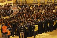 Demonstrators march during a protest in Lisbon March 6, 2014. REUTERS/Hugo Correia