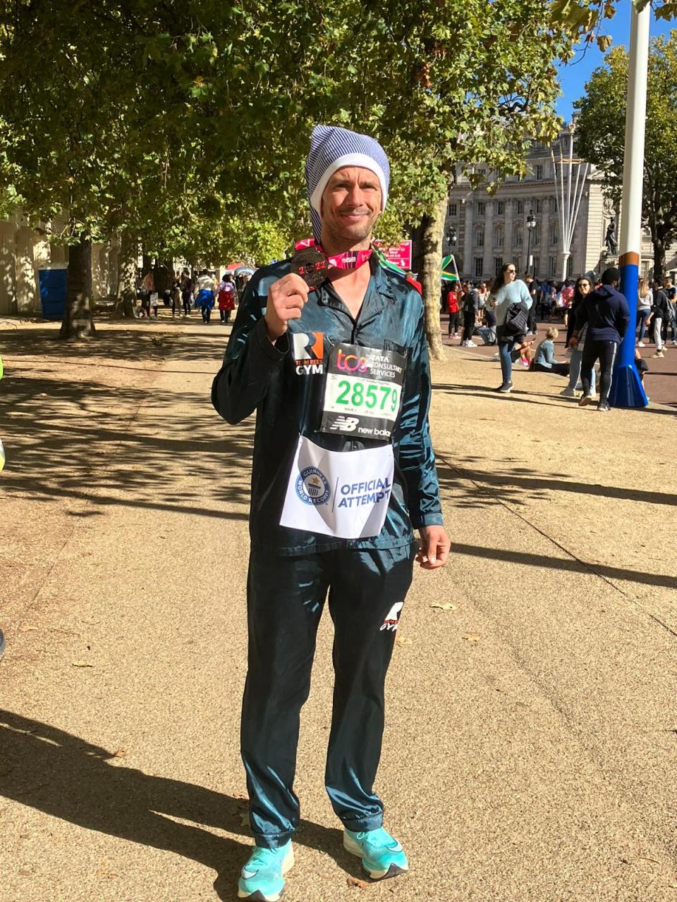 David Jones completed the marathon in 2 hours 47 minutes and 15 seconds while wearing pyjamas (Penny Holborn/PA)