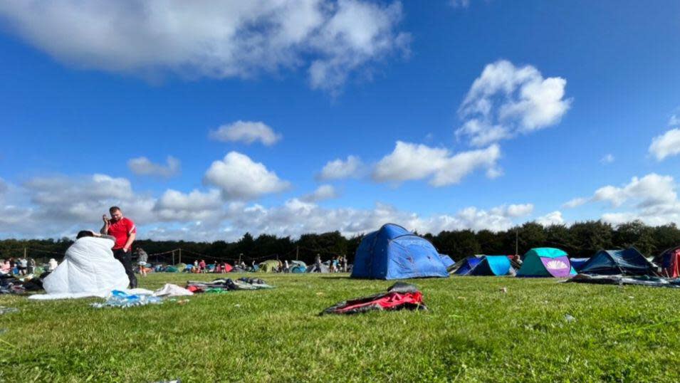 Screenshot taken from a video with permission from the social media site X, formerly Twitter, posted by @decomcfc of the campsite at Leeds Festival. Two stages at Leeds Festival have closed for the day due to high winds caused by Storm Lilian. Liam Gallagher is due to headline the music festival in Bramham Park on Friday evening, as Reading and Leeds Festivals get under way for three days of music over the Bank Holiday weekend. Picture date: Friday August 23, 2024.