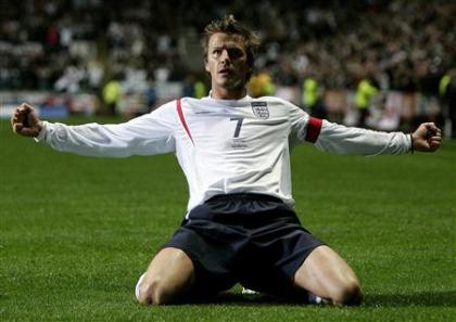 England's David Beckham celebrates his goal against Azerbaijan in 2005. (REUTERS)