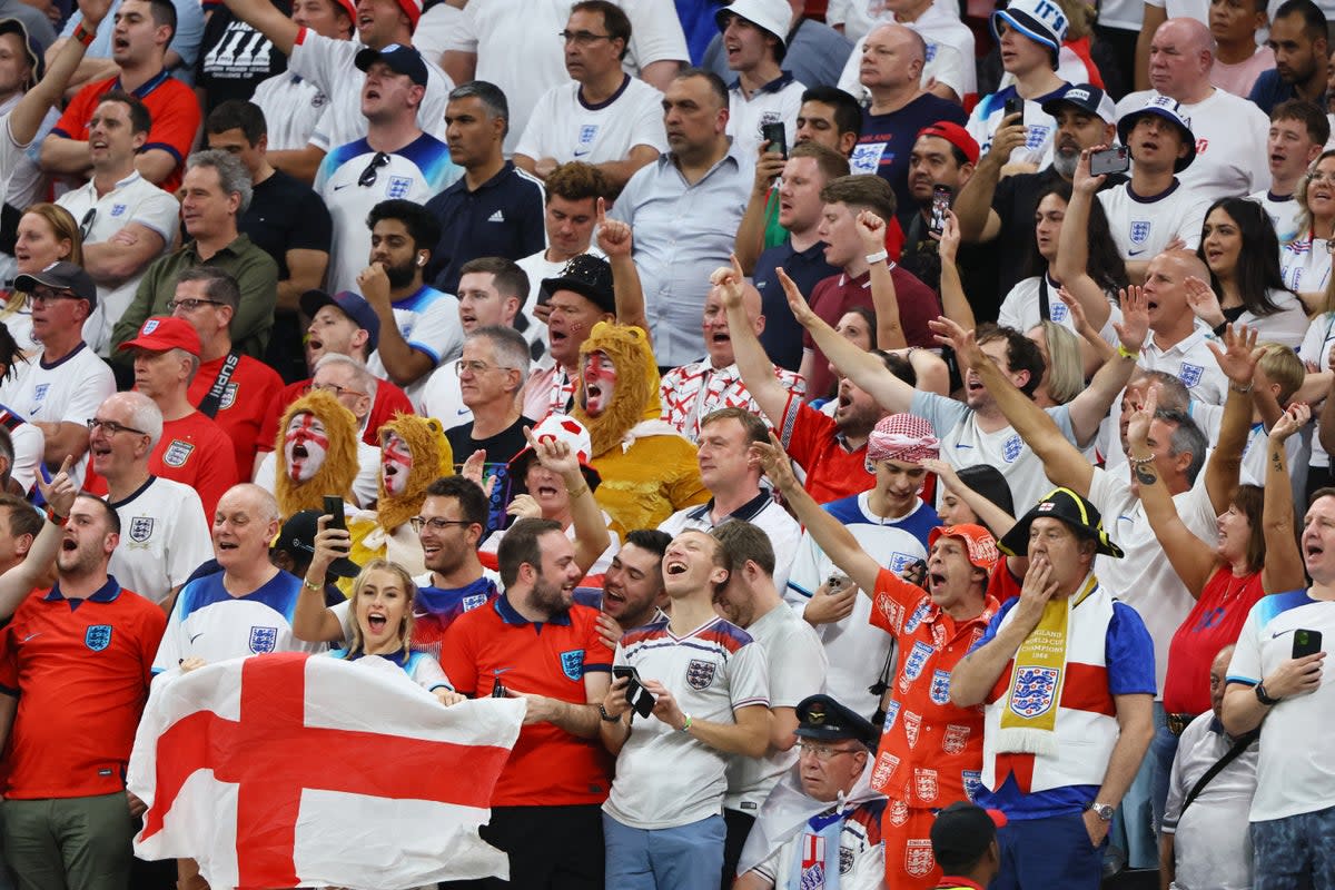 England fans watch the Three Lion’s win over Senegal at the 2022 World Cup in Qatar (REUTERS)