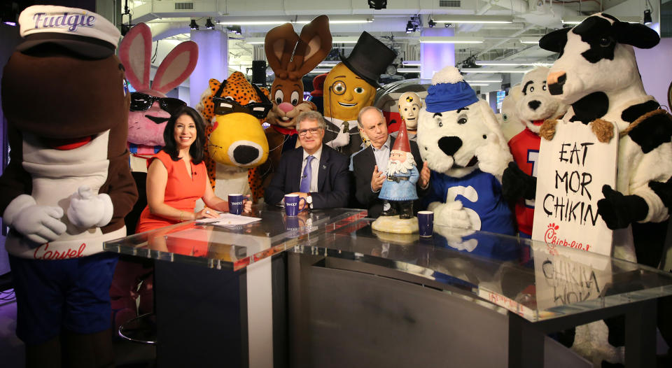 <p>Advertising Week’s Matt Scheckner, center, poses for a photo with Yahoo Finance Editor in Chief Andy Serwer, Yahoo Finance Anchor and Reporter Alexis Christoforous and a group of company mascots brought in as interns for the day at Yahoo Studios in New York City on Sept. 25, 2017. (Photo: Gordon Donovan/Yahoo News) </p>