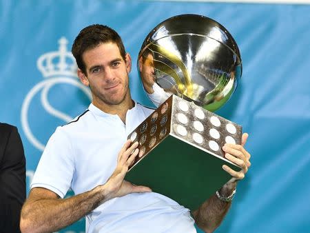 Tennis - Stockholm Open - Men Final - Royal Tennis Hall, Stockholm, Sweden - October 22, 2017. Juan Martin Del Potro of Argentina pose with a trophy after his win against Grigor Dimitrov of Bulgaria. TT News Agency/Claudio Bresciani/via REUTERS