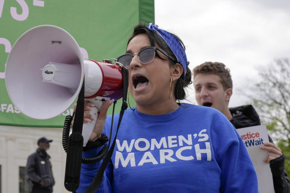 Demonstrators protest outside the Supreme Court as the justices prepare to hear arguments over whether Donald Trump is immune from prosecution in a case charging him with plotting to overturn the results of the 2020 presidential election, on Capitol Hill Thursday, April 25, 2024, in Washington. (AP Photo/Mariam Zuhaib)