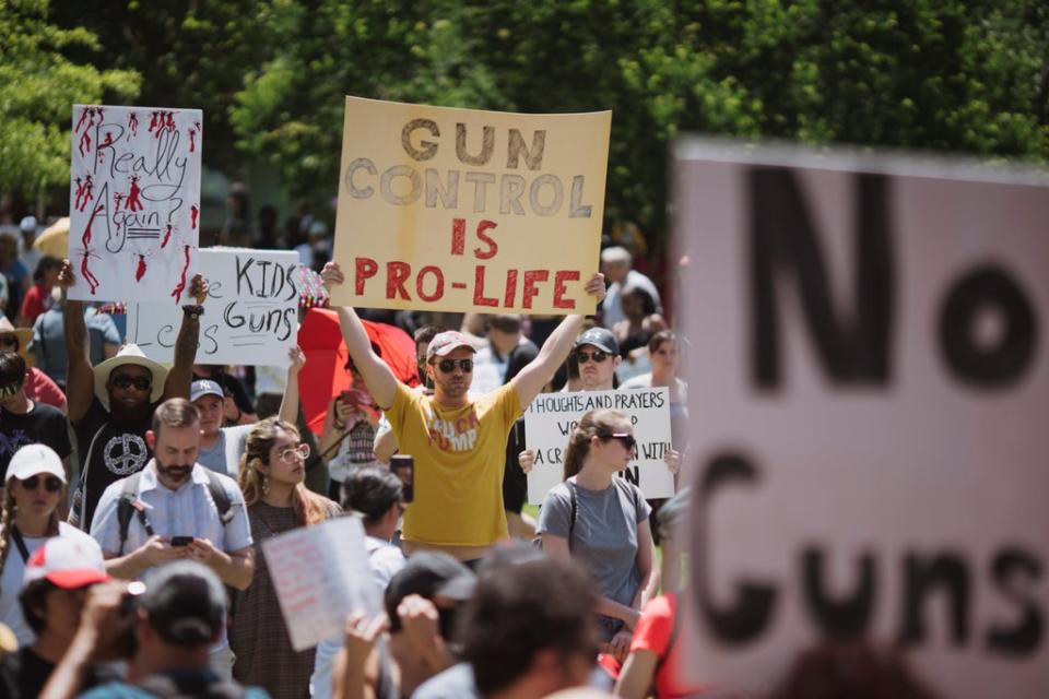 Protests outside the NRA convention (Getty Images)