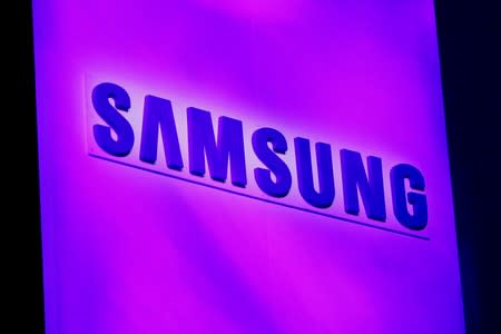 FILE PHOTO: The company logo is displayed at the Samsung news conference at the Consumer Electronics Show (CES) in Las Vegas