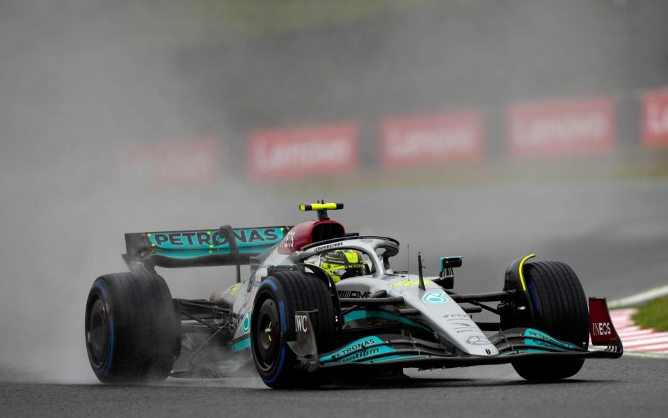 British Formula One driver Lewis Hamilton of Mercedes-AMG Petronas steers his car during the second practice session of the Japanese Formula One Grand Prix in Suzuka, Japan, 07 October 2022. The Japanese Formula One Grand Prix will take place on 09 October 2022. Japanese Formula One Grand Prix, Suzuka, Japan - Shutterstock