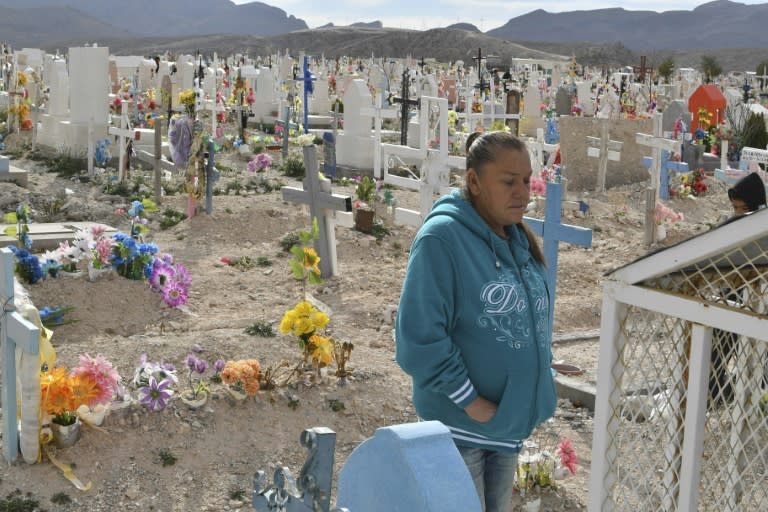 Maria Guadalupe Guereca visits the grave of her murdered son Sergio Hernandez in Ciudad Juarez, Chihuahua, Mexico