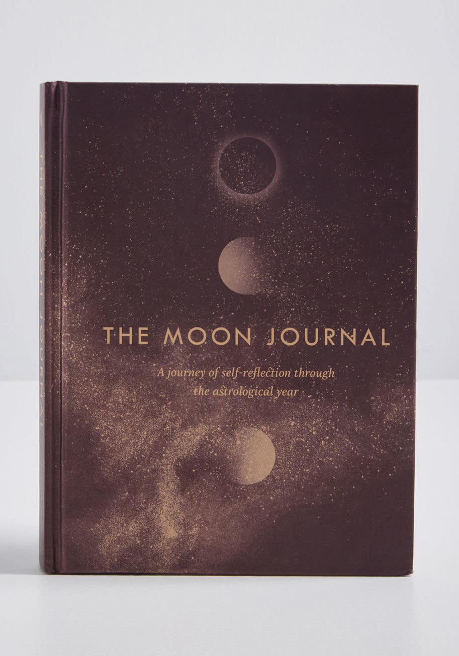 With zodiac insights and ample opportunity to reflect on the year to come, this beautiful journal invites readers to set intentions and create positive change within their own lives. Find it at <strong><a href="https://www.modcloth.com/shop/accessories/chronicle-books-the-moon-journal-in-black/100000312711.html?kpid=10107866-BLK-NS&amp;gclid=CjwKCAiAjNjgBRAgEiwAGLlf2pozMx0T9OzUgyxuy7DQosa0qdT6vqgdgmn42iID-QLF6w4B3fP6hhoCeJ0QAvD_BwE&amp;gclsrc=aw.ds">Modcloth</a></strong>.